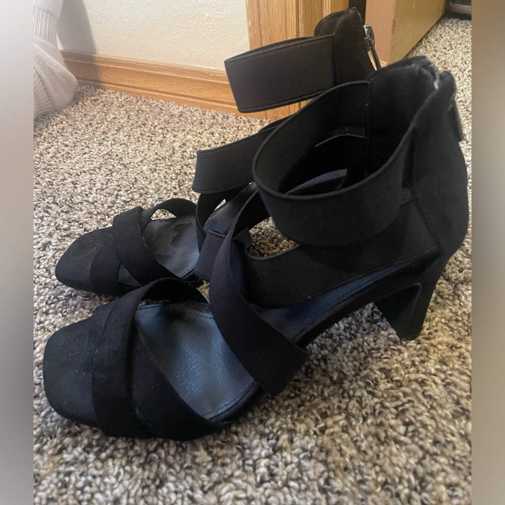 Size 6.5 black strappy heels.